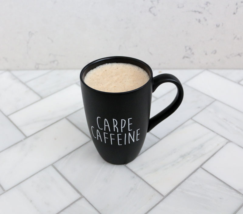 https://1111lightlane.com/wp-content/uploads/2017/01/bulletproof-coffee-in-a-black-coffee-mug-carpe-caffeine-1111-light-lane-1-of-1.jpg