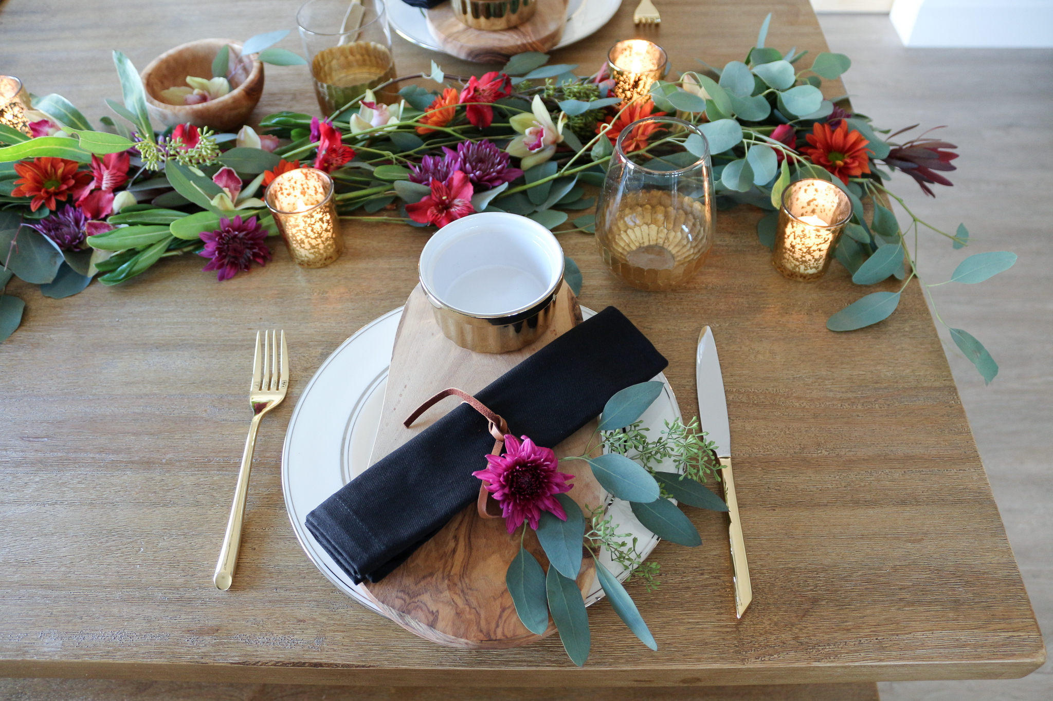 Rustic Elegant Black and Gold Christmas Tablescape