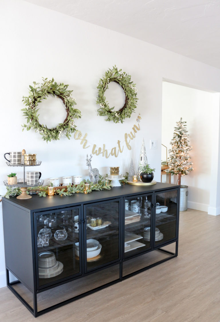 Black Sideboard Decorated Gold, White and Green for Christmas