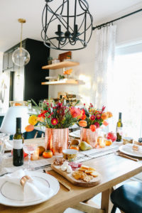 Warm + Colorful Thanksgiving Tablescape: Marigolds, Persimmons, Copper & Charcuterie Boards